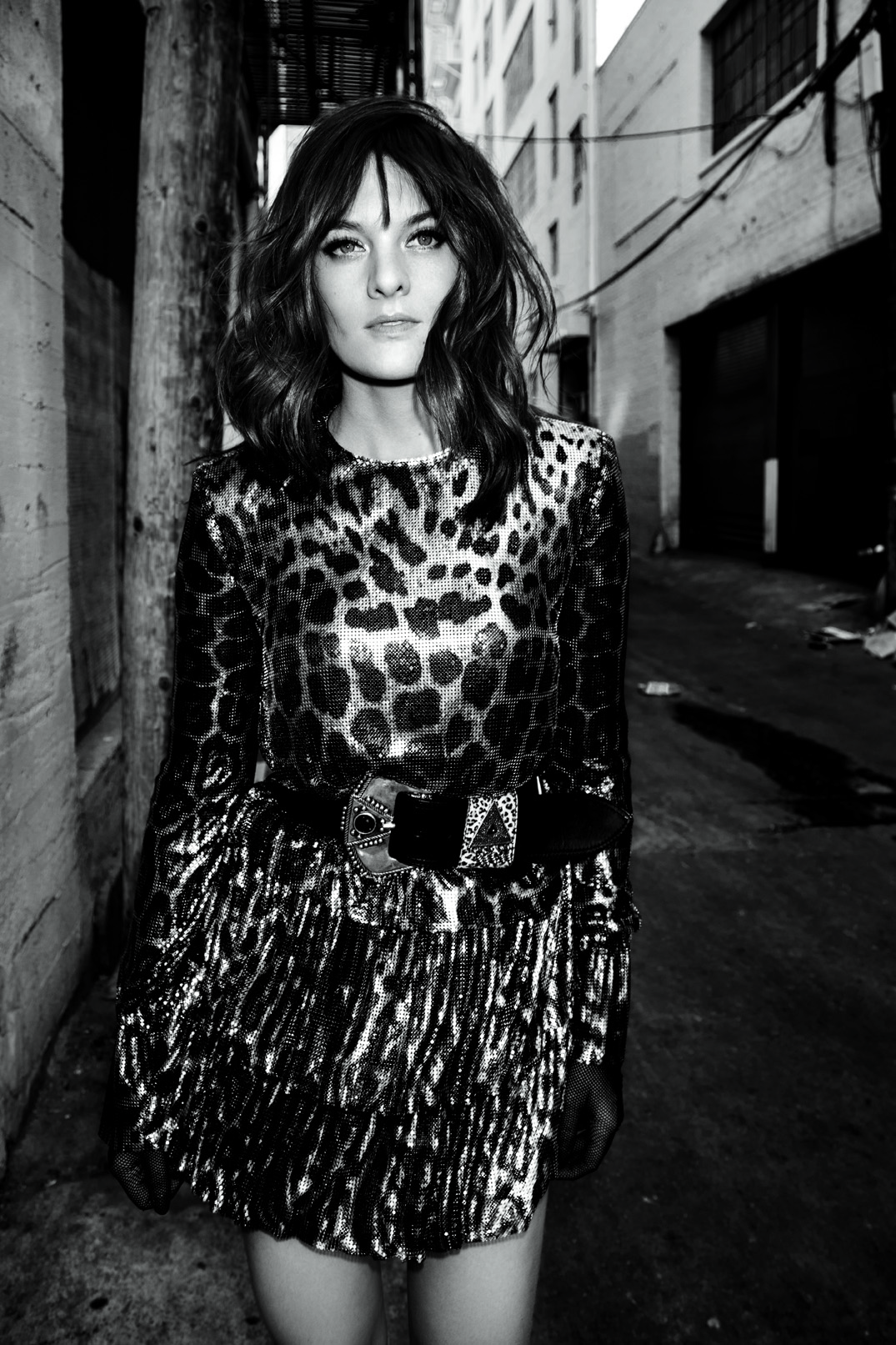  Shaw wears dress and belt Saint Laurent by Anthony Vaccarello, gloves Wing + Weft