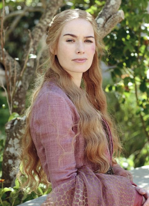 Cersei in Season 1, devoted housewife and mother, enjoys her life on the throne.