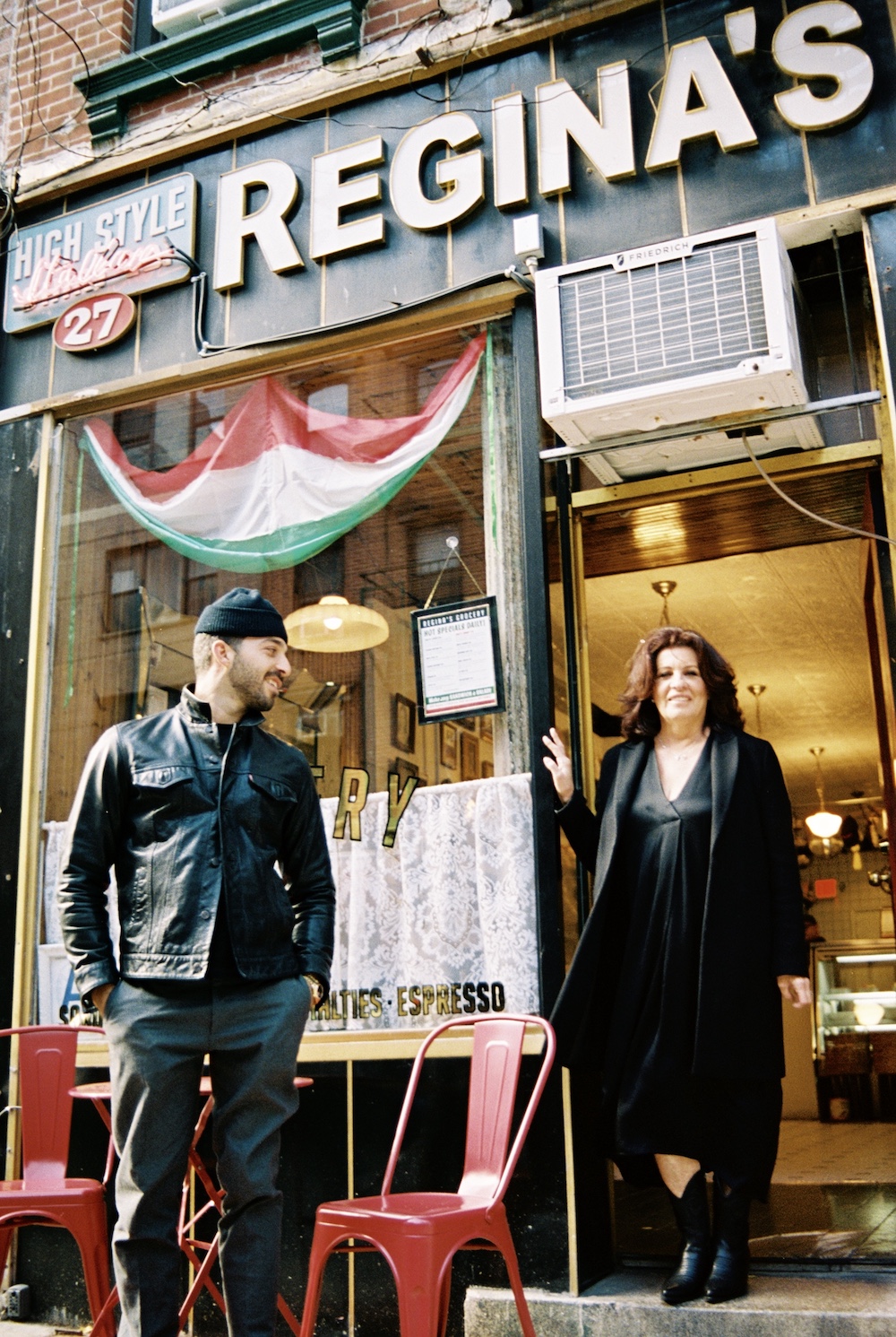  Roman and Regina Grandinetti pose outside Regina's Grocery on Orchard St.