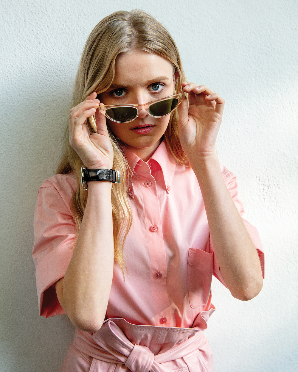  Hadley wears shirt and skirt Salvatore Ferragamo Sunglasses Oliver Peoples Watch Omega
