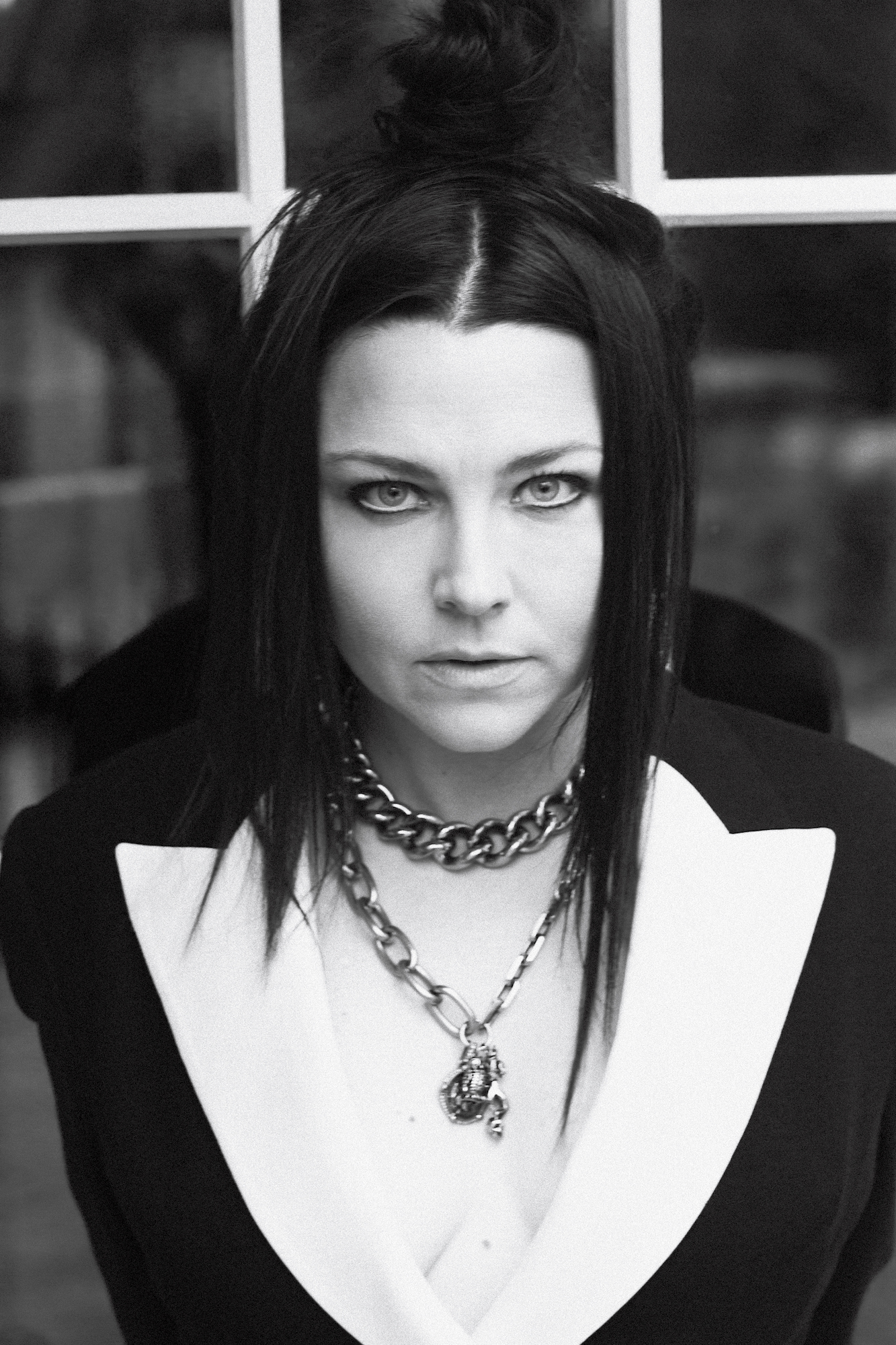  Amy wears all clothing and jewelry Alexander McQueen