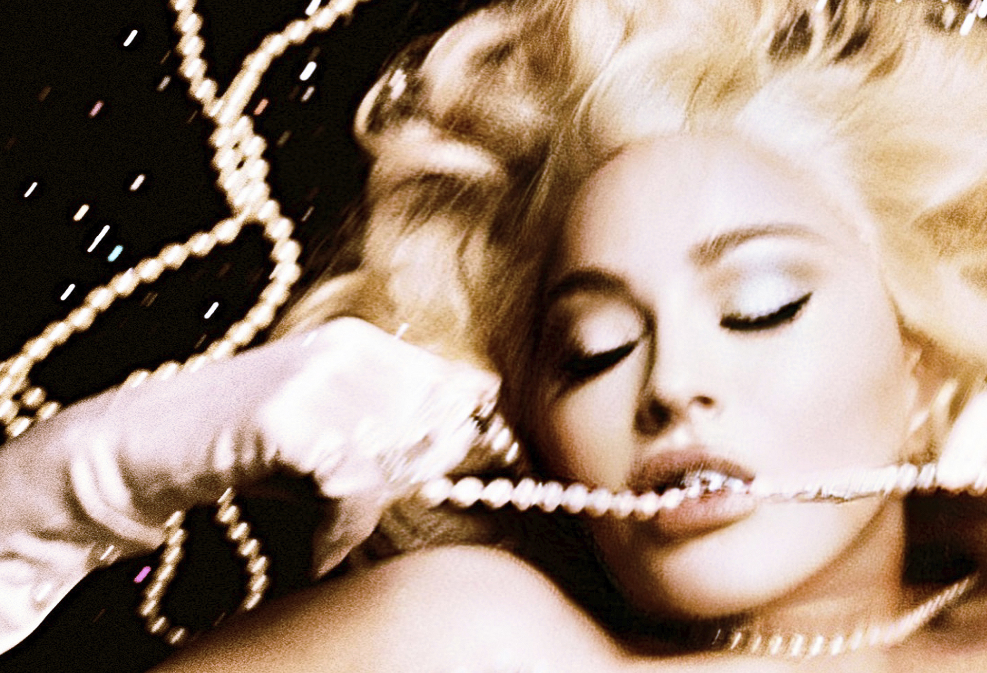  Pearl necklaces stylist’s own, Rings archival Neil Lane, Madonna’s own, Gloves Carolina Amato