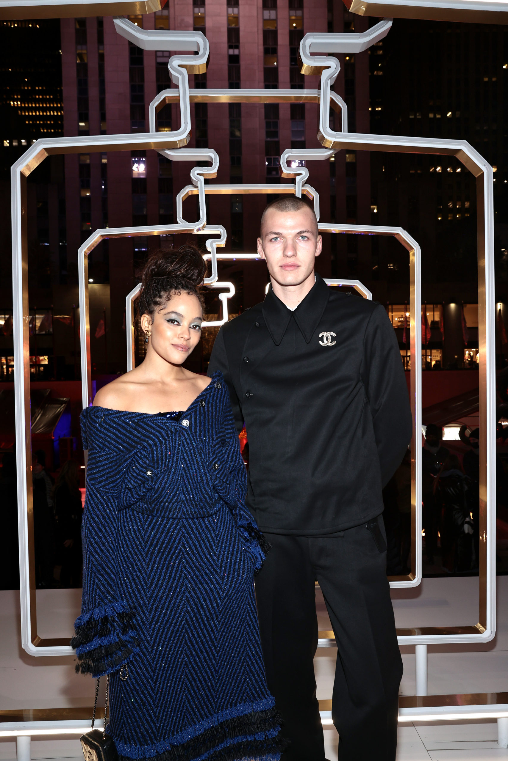  NEW YORK, NEW YORK - NOVEMBER 05: Quintessa Swindell and Jacob Hetzer attend the CHANEL Party wearing CHANEL to celebrate the debut of CHANEL N°5 in the Stars at Rockefeller Center on November 05, 2021 in New York City. (Photo by Dimitrios Kambouris/WireImage )