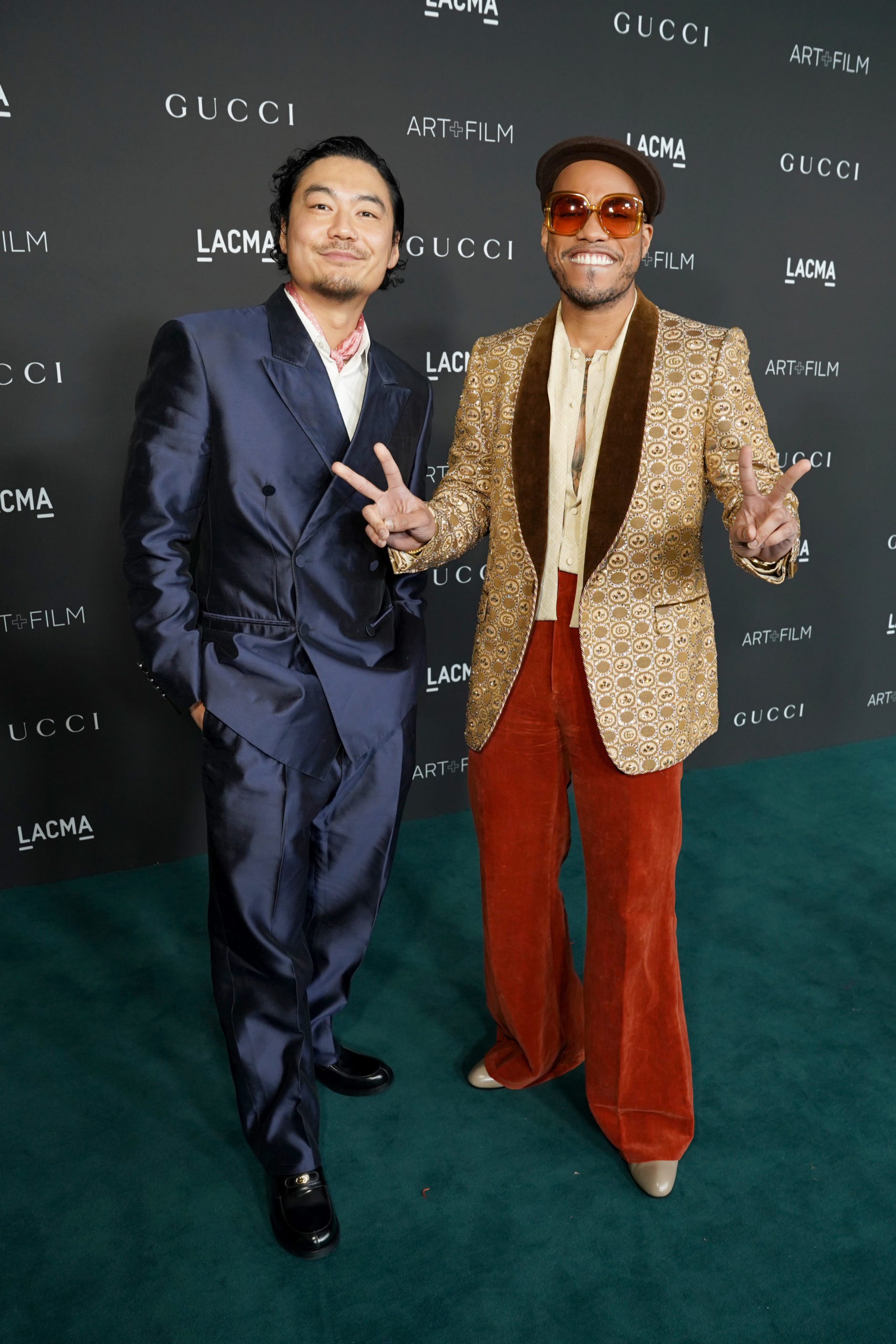  LOS ANGELES, CALIFORNIA - NOVEMBER 06: (L-R) Dumbfoundead, wearing Gucci, and Anderson .Paak, wearing Gucci, attend the 10th Annual LACMA ART+FILM GALA honoring Amy Sherald, Kehinde Wiley, and Steven Spielberg presented by Gucci at Los Angeles County Museum of Art on November 06, 2021 in Los Angeles, California. (Photo by Presley Ann/Getty Images for LACMA)