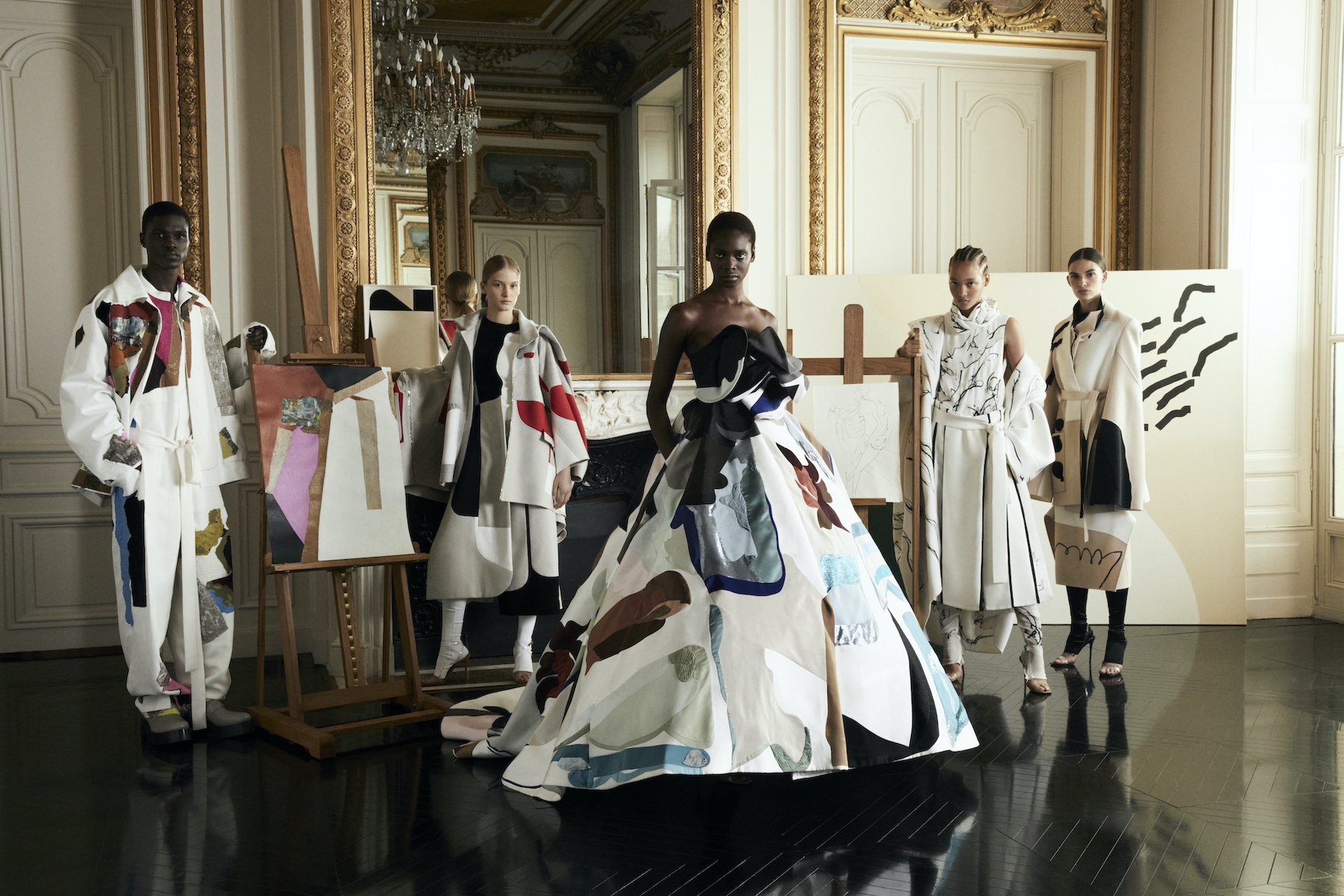  Photography Alvaro Beamud Cortês, Fashion Gro Curtis | Mamadou, Nathalie, Marie, Sculy, and Typhanie wear all clothing and accessories Valentino Haute Couture /// Artwork from left to right: “Untitled 2018” by Francis Offman / “1561” by Katrin Bremermann / “Disegno 60 per 60 - 3” by Benni Bosetto, “Vulcano” by Malte Zenses / Center gown inspired by, but not pictured: “La Roda, 2017” by Patricia Trieb