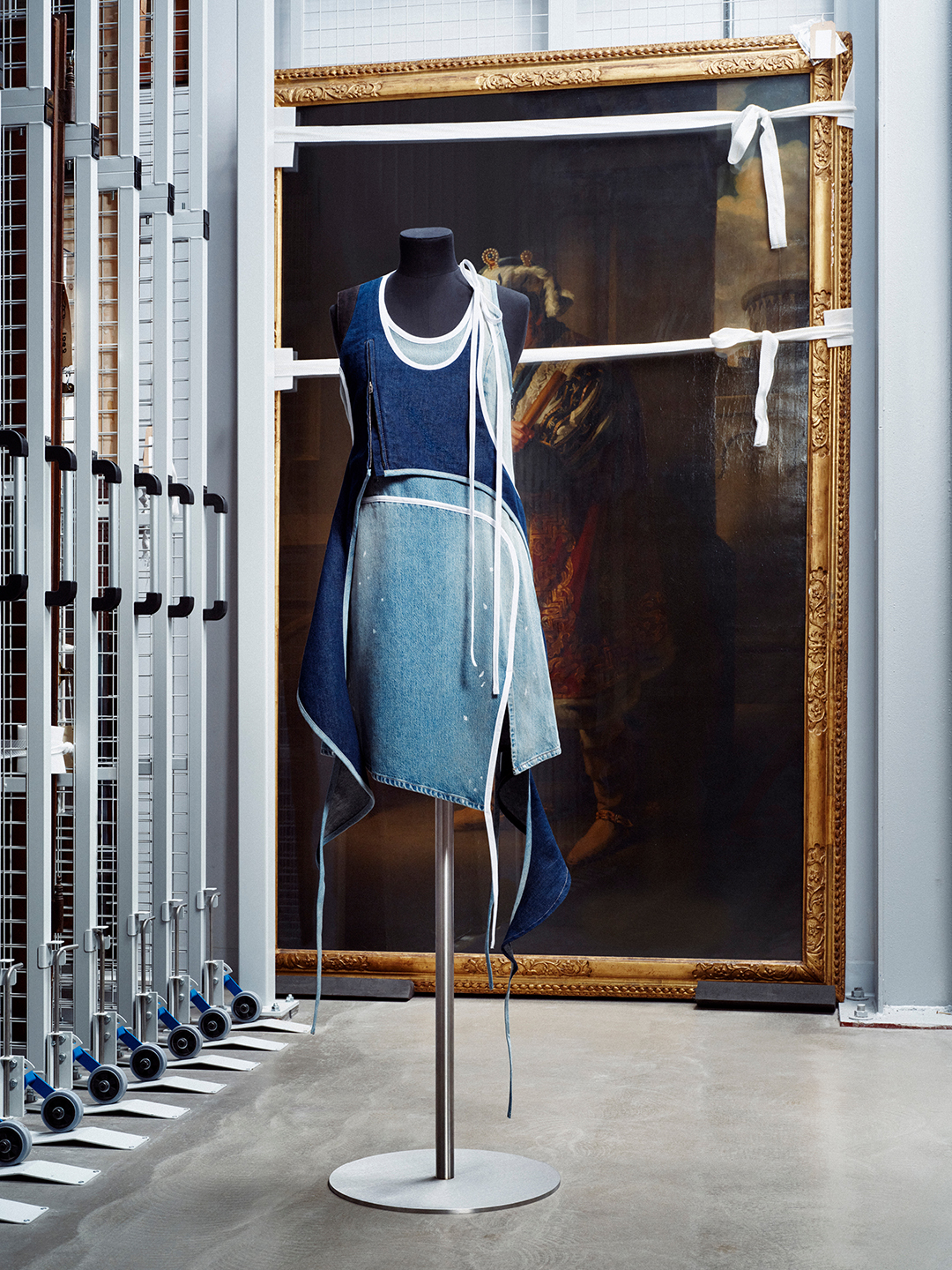 Acne Studios x Hussein Chalayan campaign image shot at V&A East Storehouse featuring patchwork denim pieces